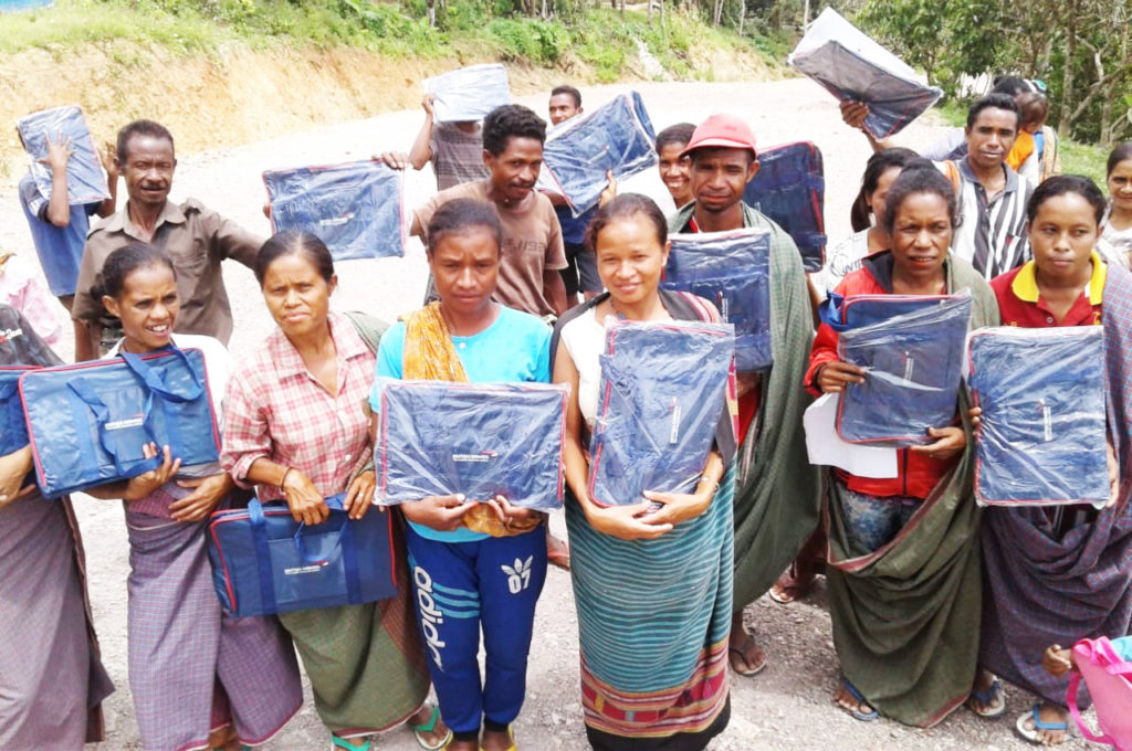 Everyone happy to receive new school bags