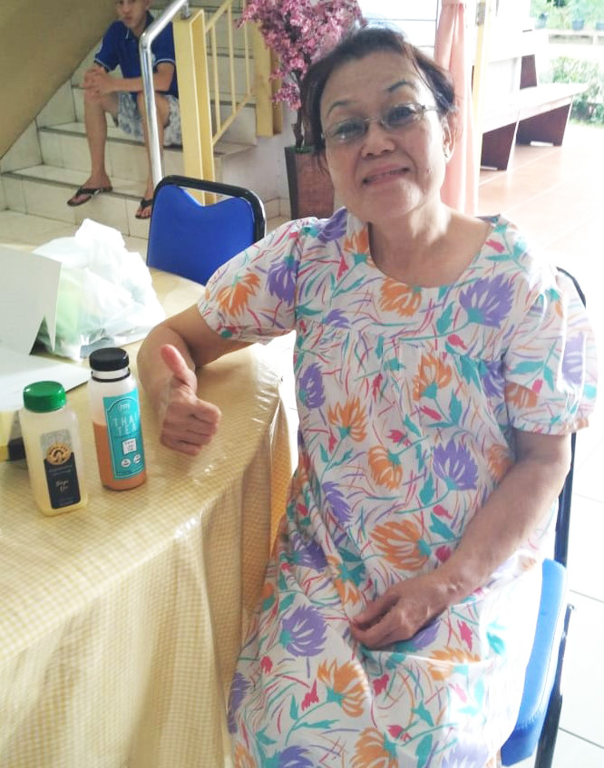 Happy grandmother with her drinks